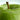 Close up of green apple for Madara Exosomes Longevity Radiance Peptide Serum with text on product benefits
