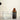 Drops of Kiki Health Ionic Iron Liquid Concentrate being added to a glass of water