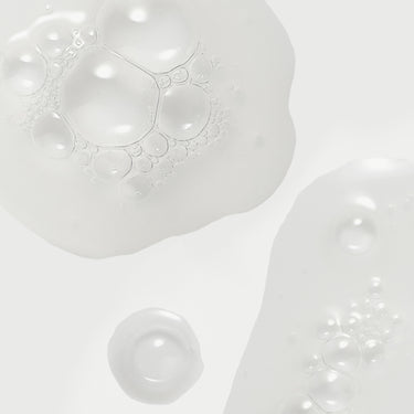 Close-up of the clear serum texture of Ere Perez Grape Water Eye Serum