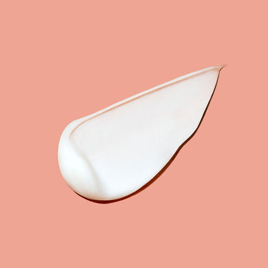 Swatch of the white cream texture of Innersense Color Awakening Shampoo & Conditioner