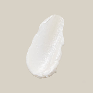 Swatch of the white cream texture of Innersense Hair Renew Scalp Balance Duo