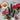 Flat lay of John Masters repair range with honey and flowers