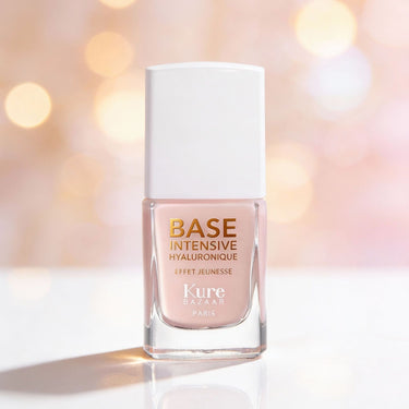 Kure Bazaar Base Intensive - Hyaluronic Base Coat & Treatment on shelf with pink background