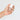 Kure Bazaar French Nude Nail Polish shown on a hand