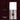 Biogel Keratine nail polish in the shade Parisienne, shown in a sleek silver bottle with a white cap on a dark burgundy background, alongside a brush and the Kure Bazaar logo.