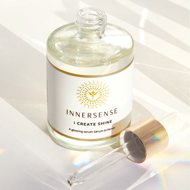Bottle of Innersense I Create Shine with pipette showing oil